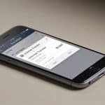ecran de smartphone affichant notification de virement inconnu